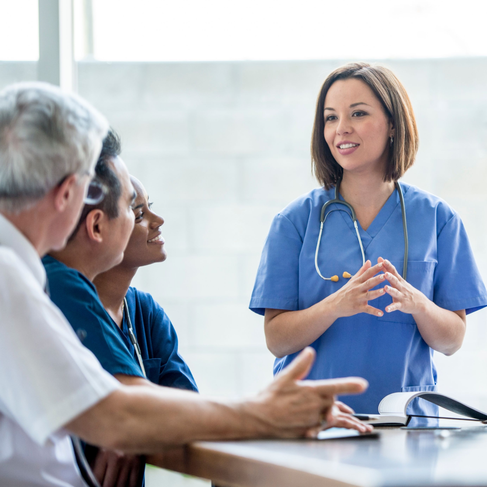 doctor explaining to a group