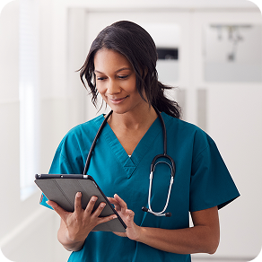 nurse working on tablet